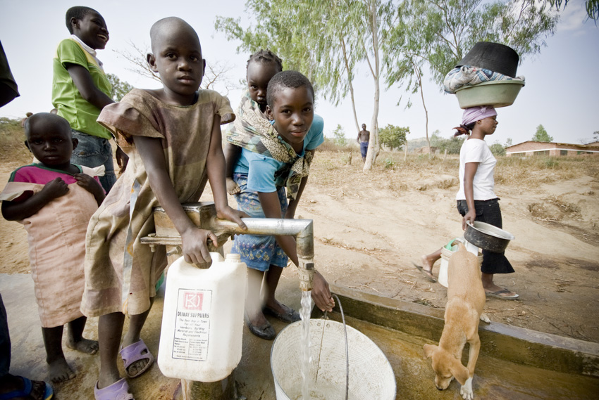 Villagers collect water, Kayelekera Village, Malawi, 2009. Photo by Jessie Boylan